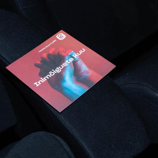 Booklet of the film festival resting on cinema chairs